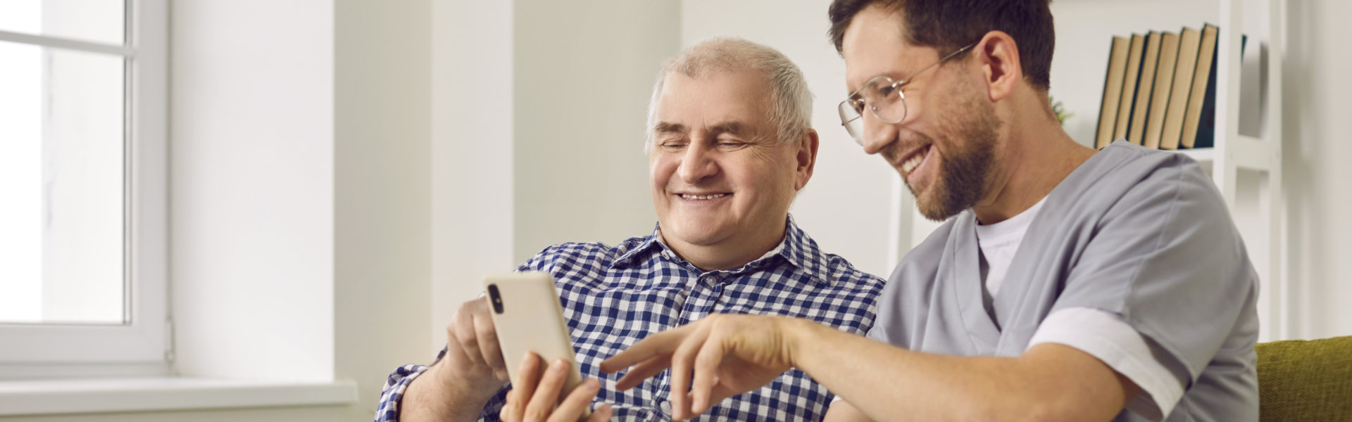 caregiver and elderly reading